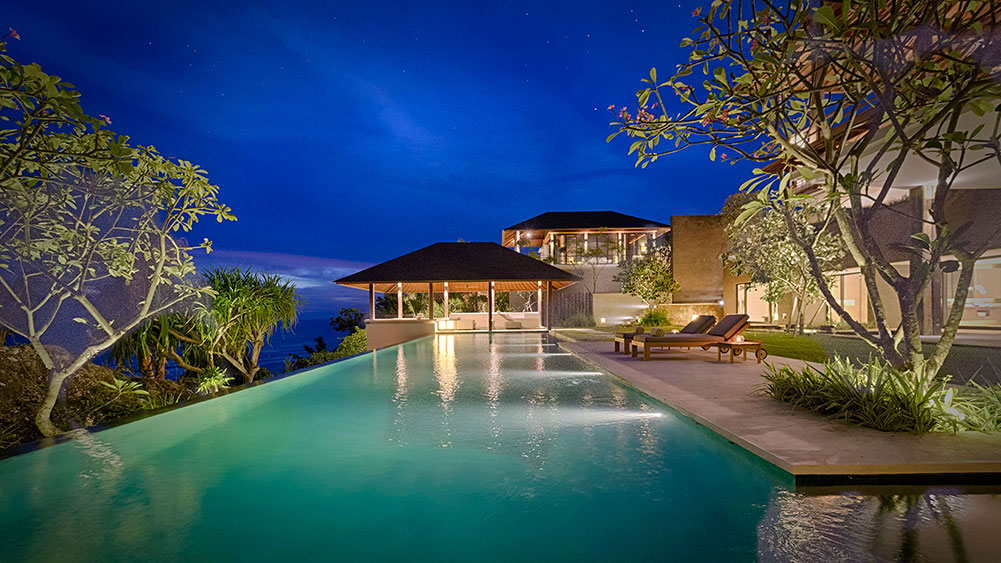 Sohamsa Ocean Estate - Villa Soham - Serene pool area at nightfall